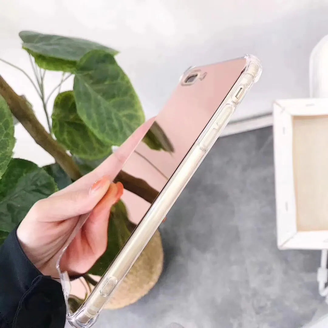 Black mirror-finish TPU protective case on an iPhone, showing soft edges and full screen coverage.