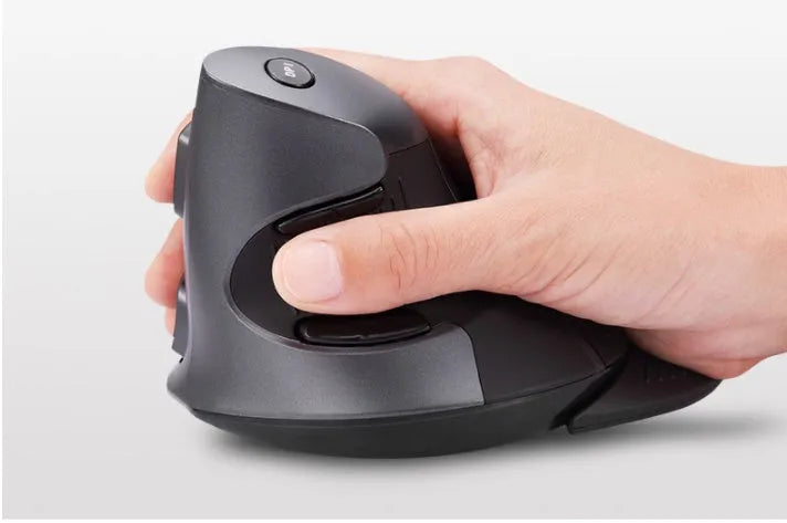 Black M618 wireless vertical ergonomic mouse on a desk, showing its 57-degree angled design and contoured right-hand shape.