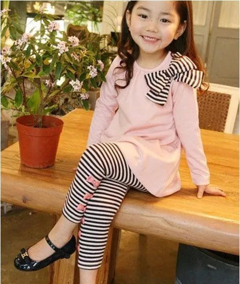 Pink cotton girls' clothing set shown in sizes from 110cm to 140cm