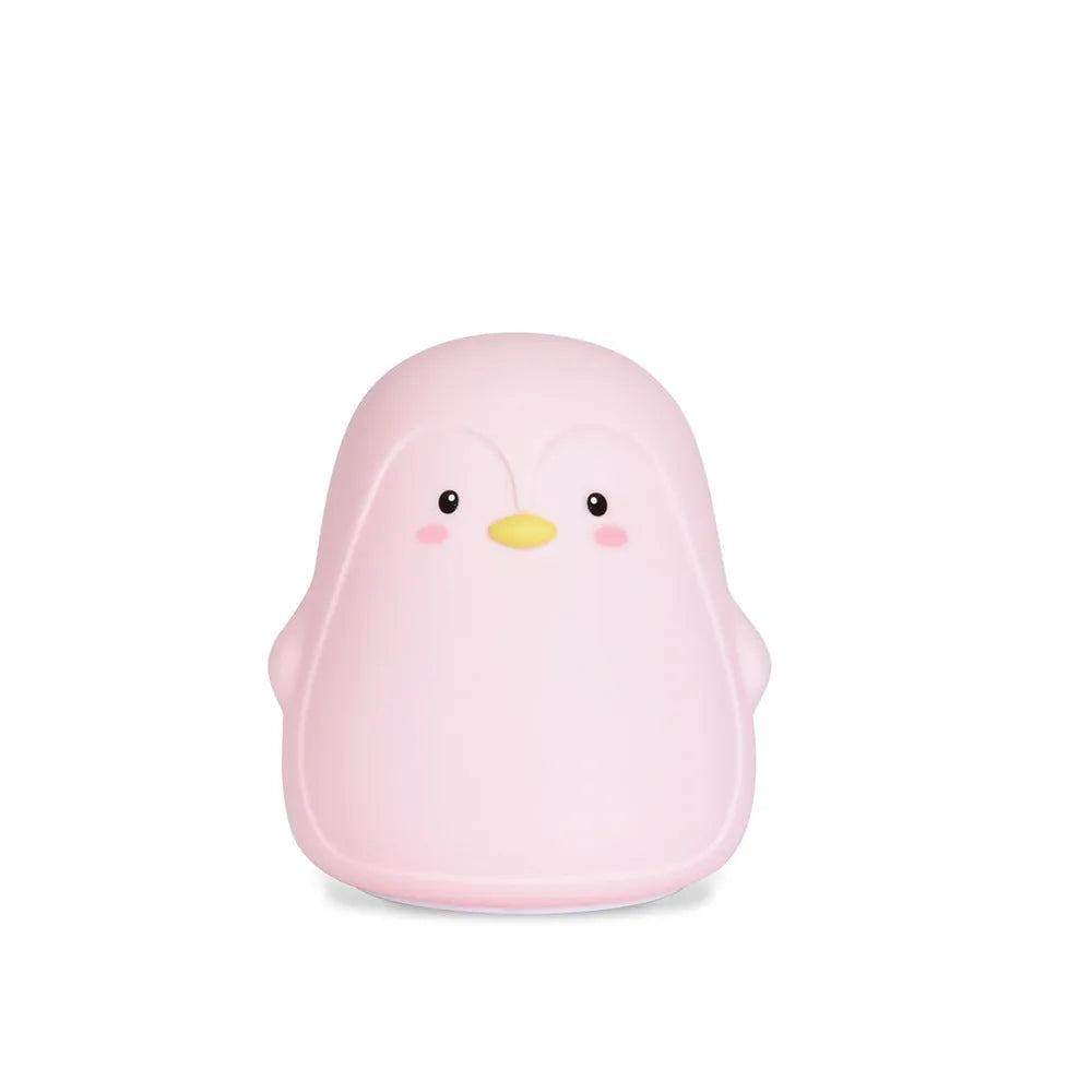 Soft white silicone penguin-shaped rechargeable night light on a surface.
