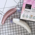 Rose gold and white electric blackhead suction instrument, model JY-666 Pore Beauty Cleanser.