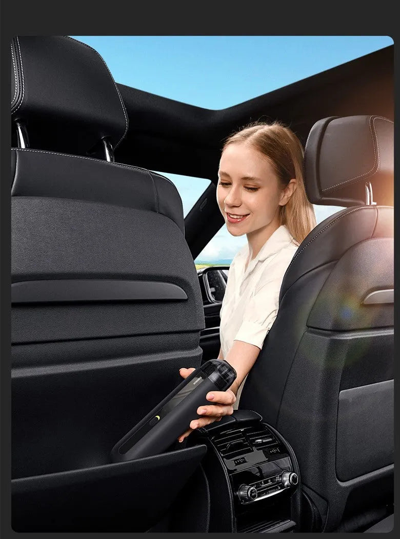 Baseus wireless handheld car vacuum cleaner in black, shown with blowing hose attachment and Type-C charging cable.