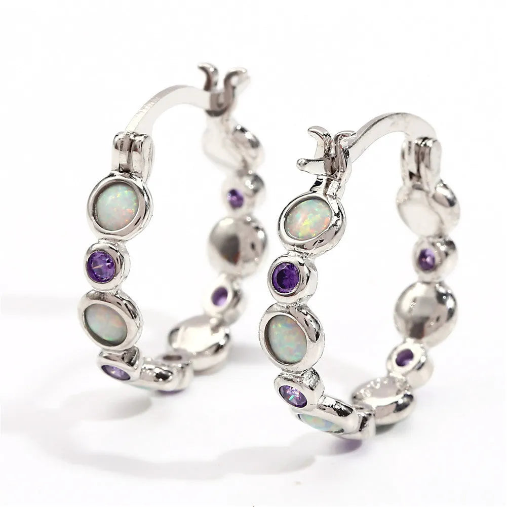 Round synthetic opal and cubic zirconia clip-on earrings in electroplated copper