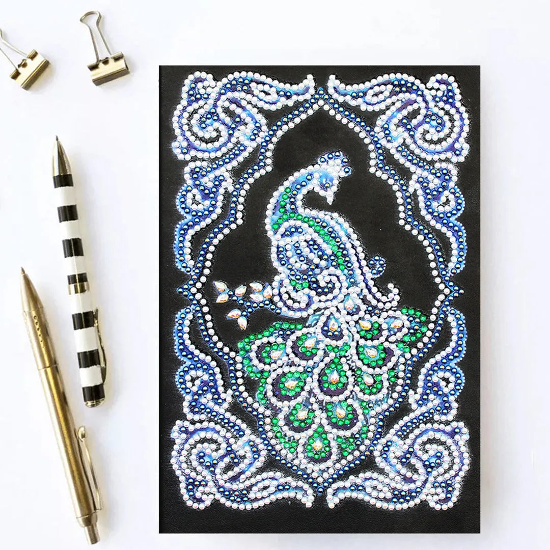 Black A5 Peacock Beauty diamond painting notebook with sparkling shaped drills on cover, showing 142x207mm size.