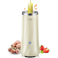 Beige white and green compact automatic mini breakfast machine on a kitchen counter.
