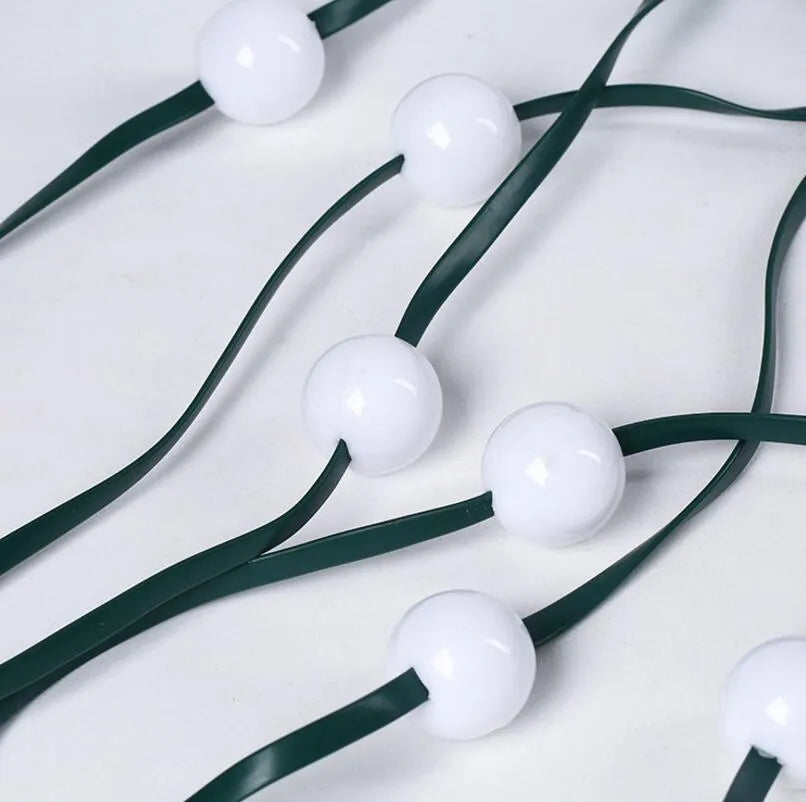 64-LED Christmas tree light string with colour-changing bulbs and integrated control button, 1.8 metres long with IP44 weather resistance