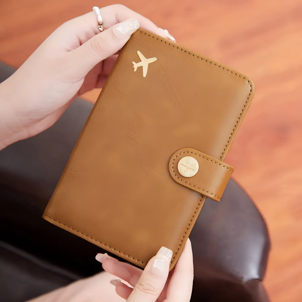 PU passport holder wallet in multiple colours with zip closure and visible sewing detail.