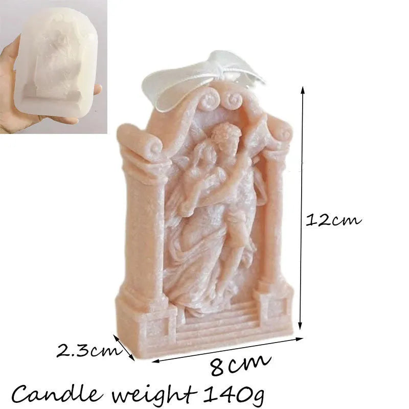Flexible food-grade silicone mold for making hug angel couple figurines from wax, chocolate, or plaster.