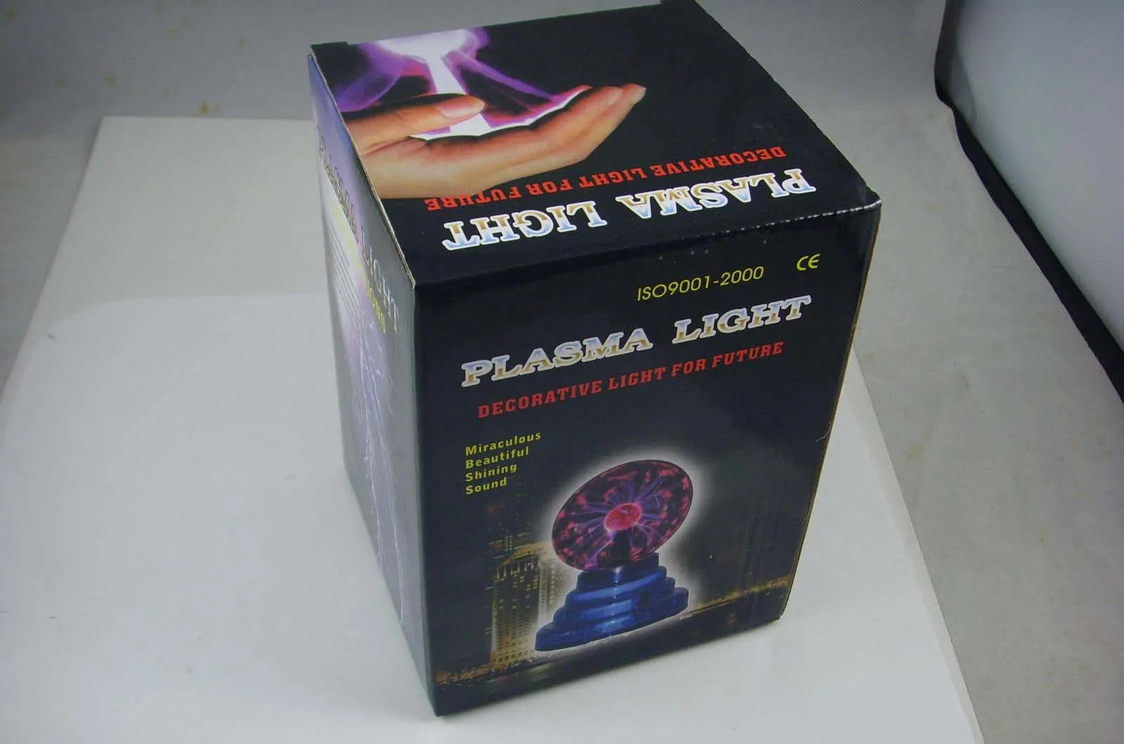 Colourful USB-powered decorative light sphere with 7.62cm glass ball on ABS base