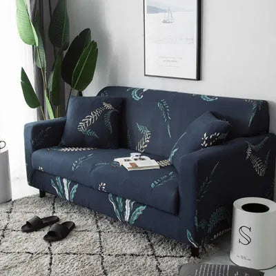 Geometric patterned stretch sofa slipcover fitted on a three-seater sofa