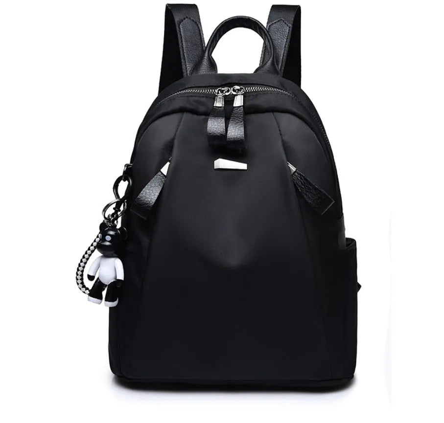 Medium square rucksack in wine red with front digging bag and dual straps.