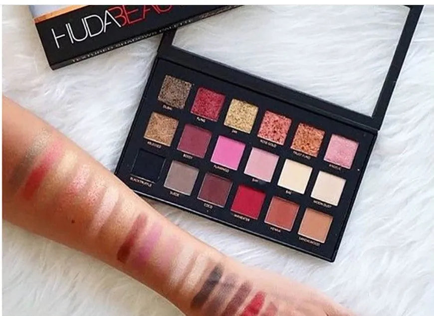 Desert Sun eye shadow palette open to show 12 warm neutral pans in matte and shimmer finishes with built-in mirror