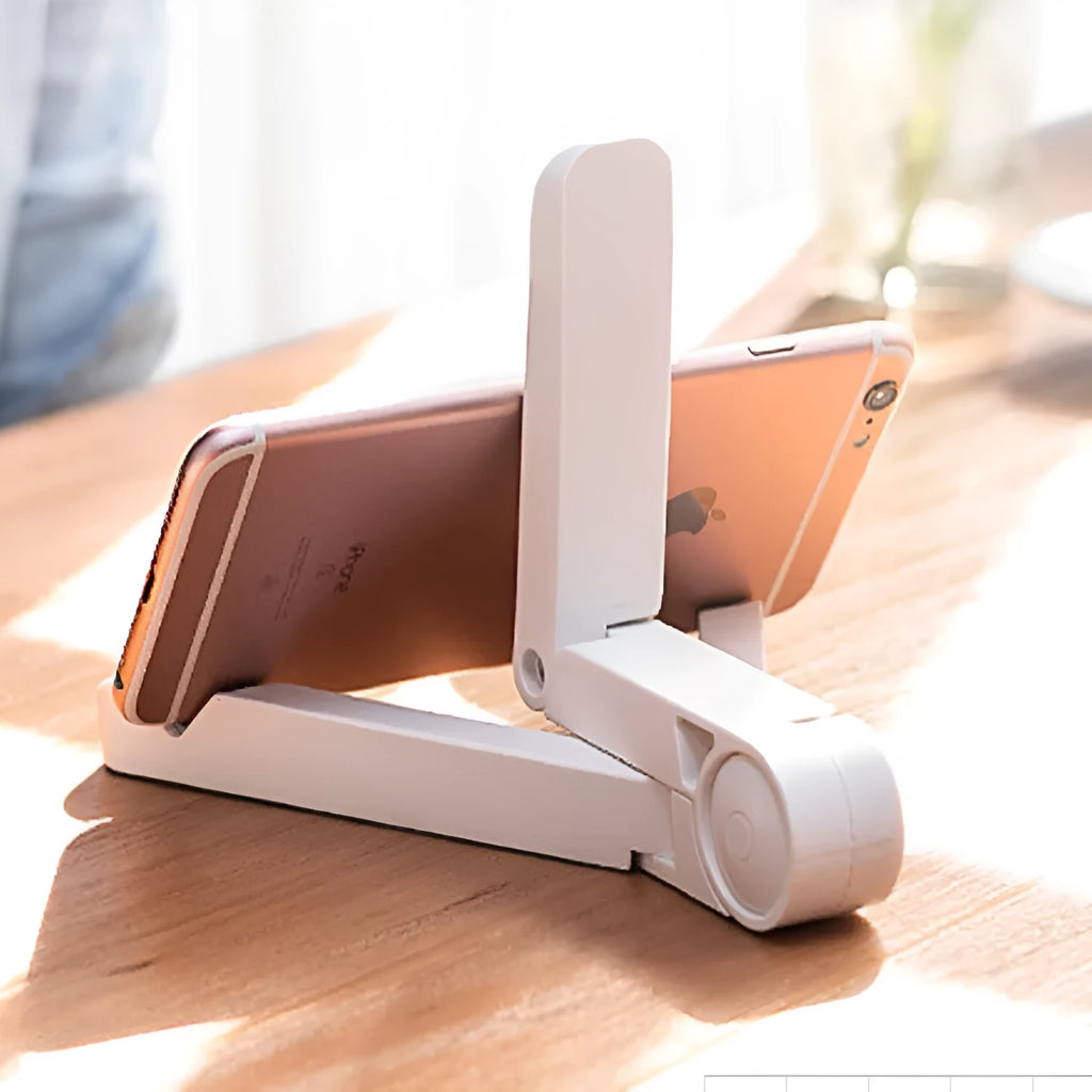 Black foldable tablet holder displaying smartphone in landscape position on desk