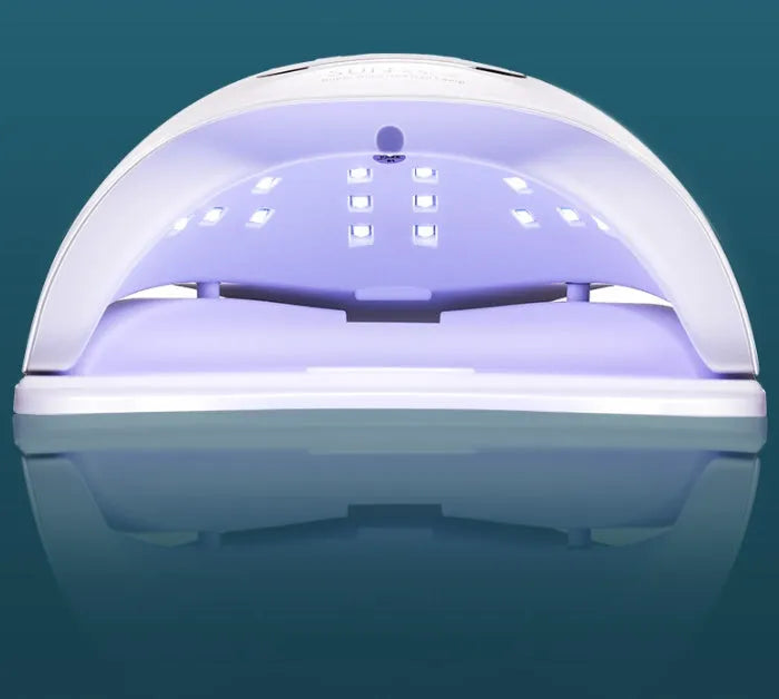 White nail polish drying lamp with dual UV/LED light source and timer controls