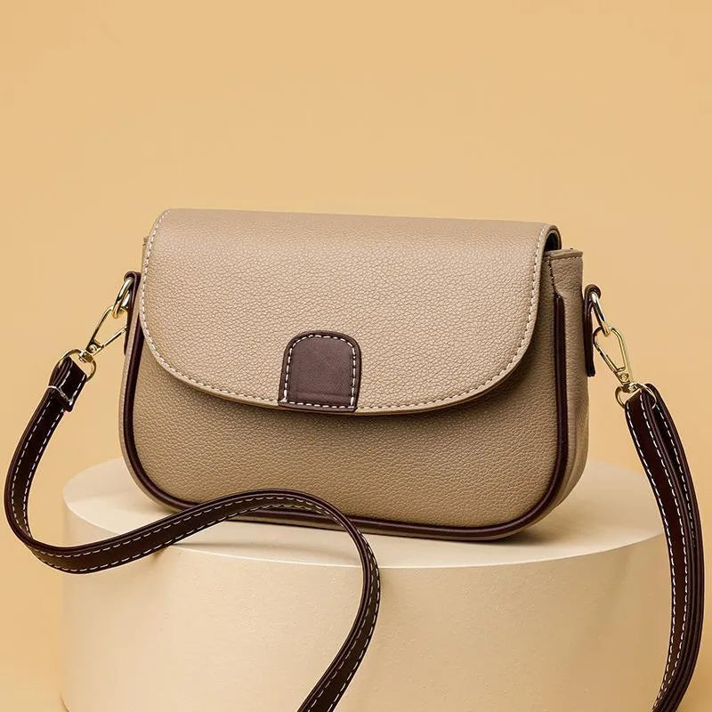 Small square PU crossbody bag with flap closure and adjustable strap in khaki, black, blue, yellow
