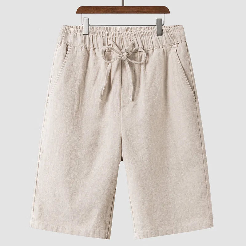 Men's linen shorts in loose cropped style with elastic waistband in various colours