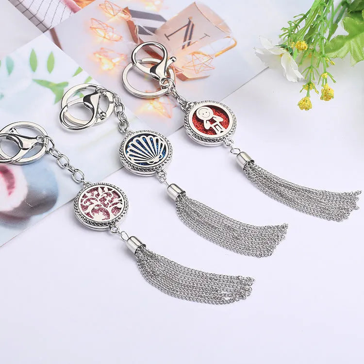 Alloy car aromatherapy pendant with tassel decoration and 50cm chain