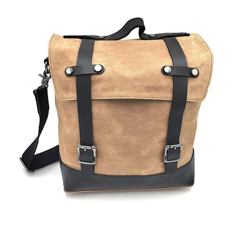 Black waterproof canvas motorcycle side bag with dimensions 300x280x150mm mounted on motorcycle