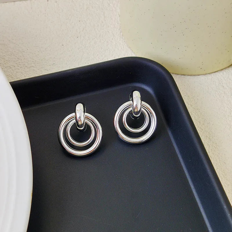 Simple geometric round ring earrings for women in gold or silver electroplated finish mixed material