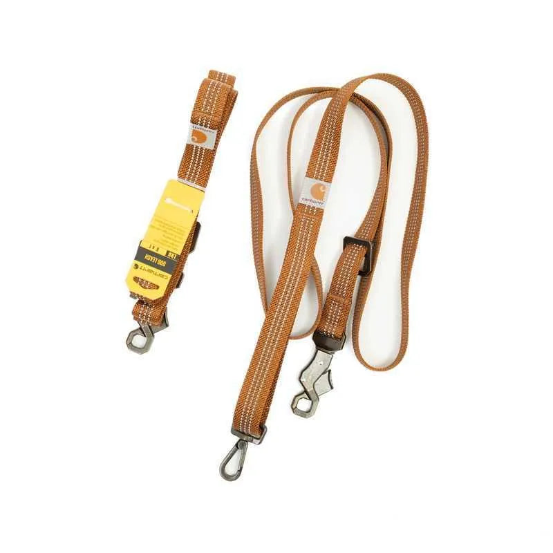 Dog training chest strap harness and reflective hand holding rope laid out, showing the 1.8 metre lead length.