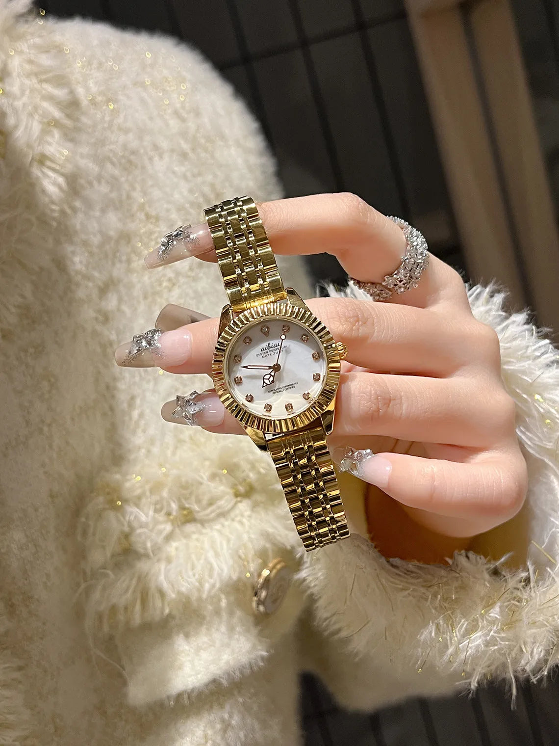 Women's rose shell watch with 7mm thin case, shown with white, red, or black leather strap or steel belt