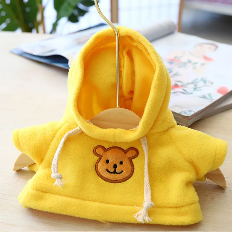 Blue dog hoodie sweater on a small dog, showing the hood and front opening.