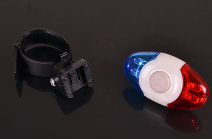 Red and blue LED equipment tail light with adjustable base showing horizontal and vertical placement options