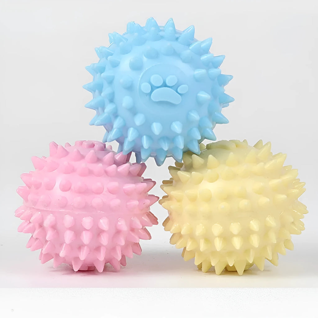 Blue TPR dog chewing ball with textured footprint design for teeth cleaning, 6cm diameter