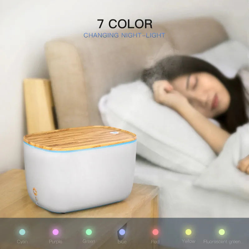 GX-22K household aromatherapy atomiser with 1.8L tank and night light on a wooden surface.