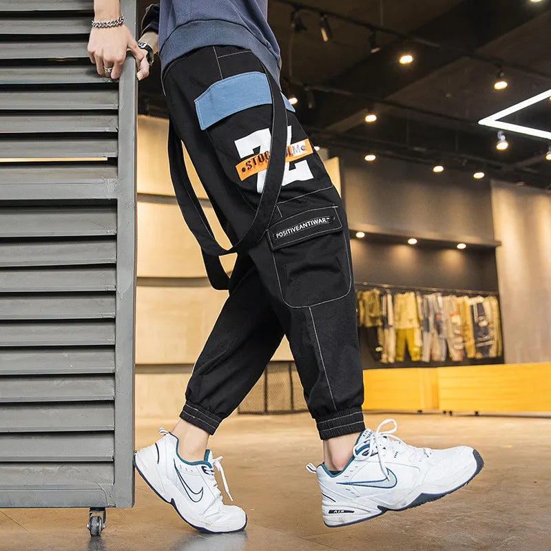Men's multi-pocket loose fit workwear casual pants in black, grey, and light green with T400 cotton fabric