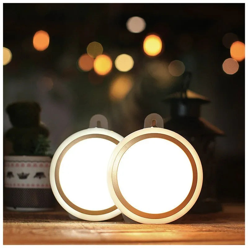 Circular white motion sensor LED light with infrared sensor, 80mm diameter, for wardrobe or corridor.
