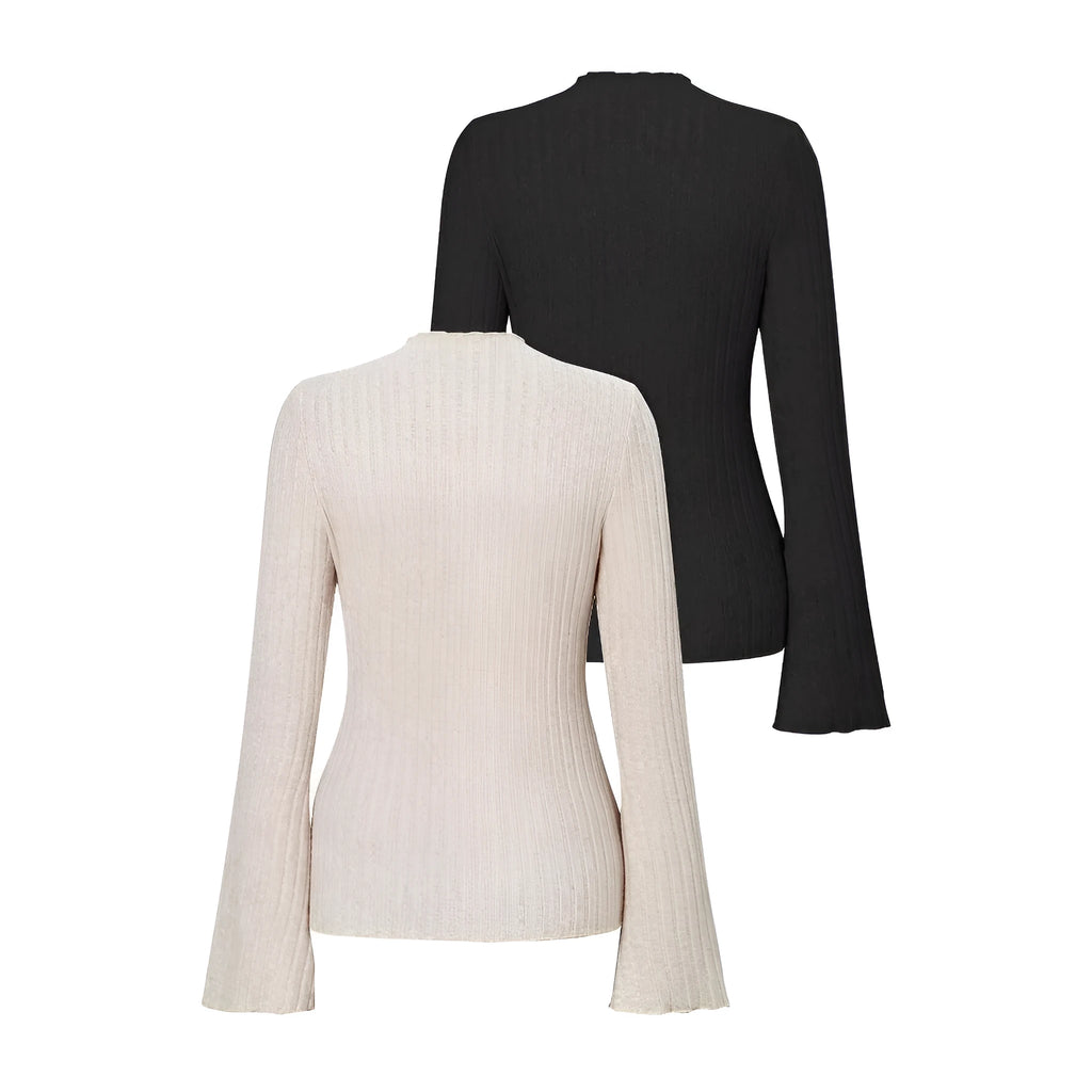 Long sleeve black top with lantern sleeves and sunken stripe texture, laid flat.