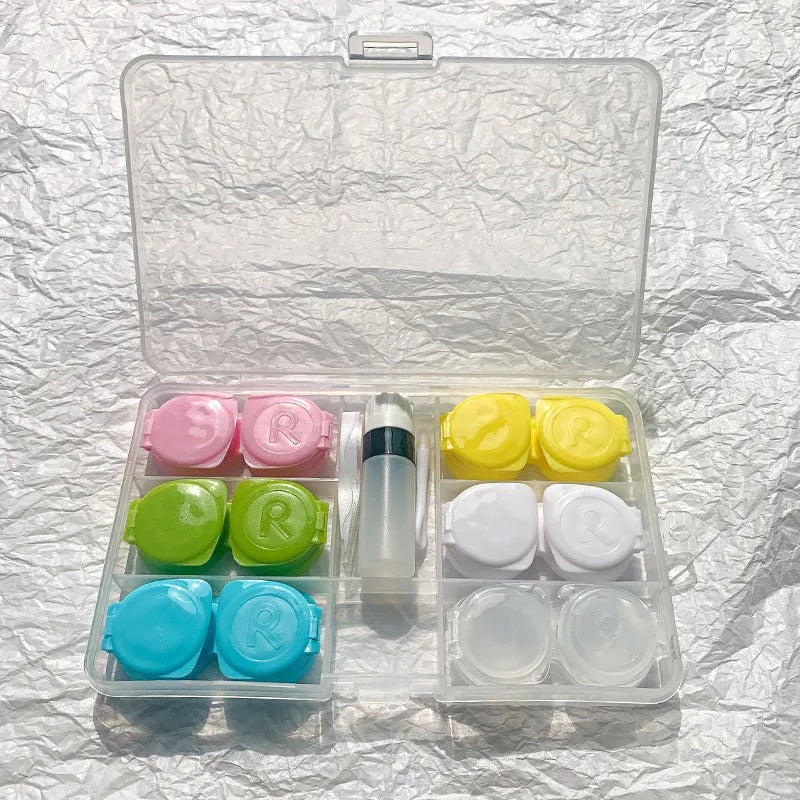 Rectangular contact lens case in various colour combinations including black white and pink white