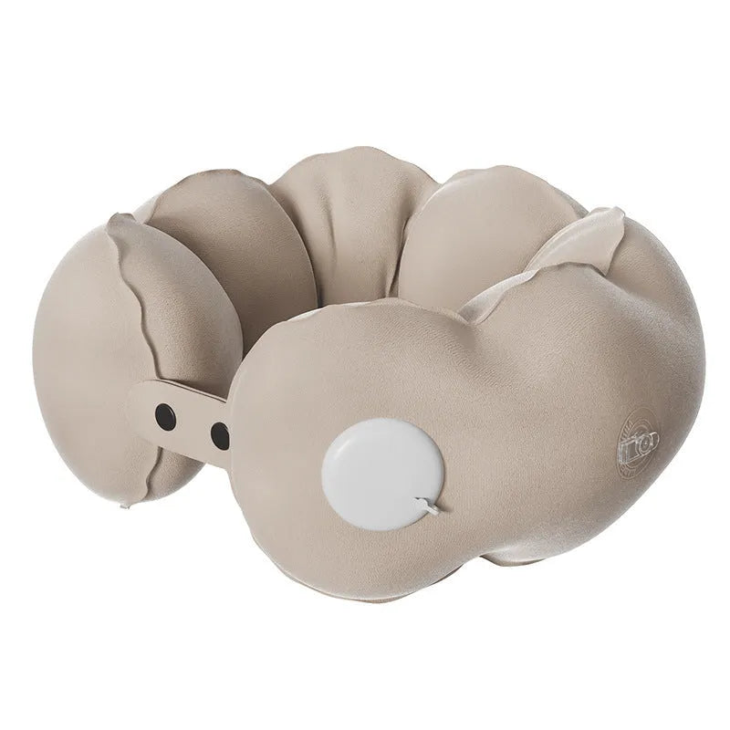 Inflatable U-shaped cartoon travel neck pillow in Cloud Bubble colour, shown deflated and portable.