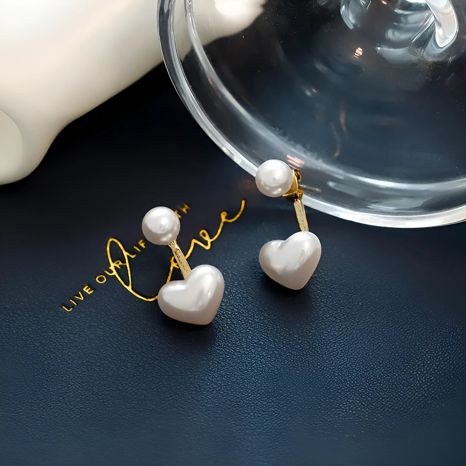 Women's heart-shaped pearl stud earrings with Korean style design and electroplated alloy construction