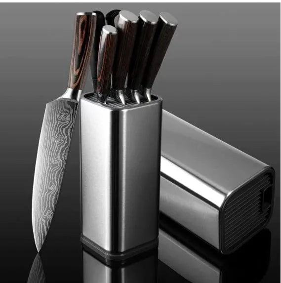 Black and white multifunctional kitchen tool holder with detachable bottom for storing knives and cutlery.