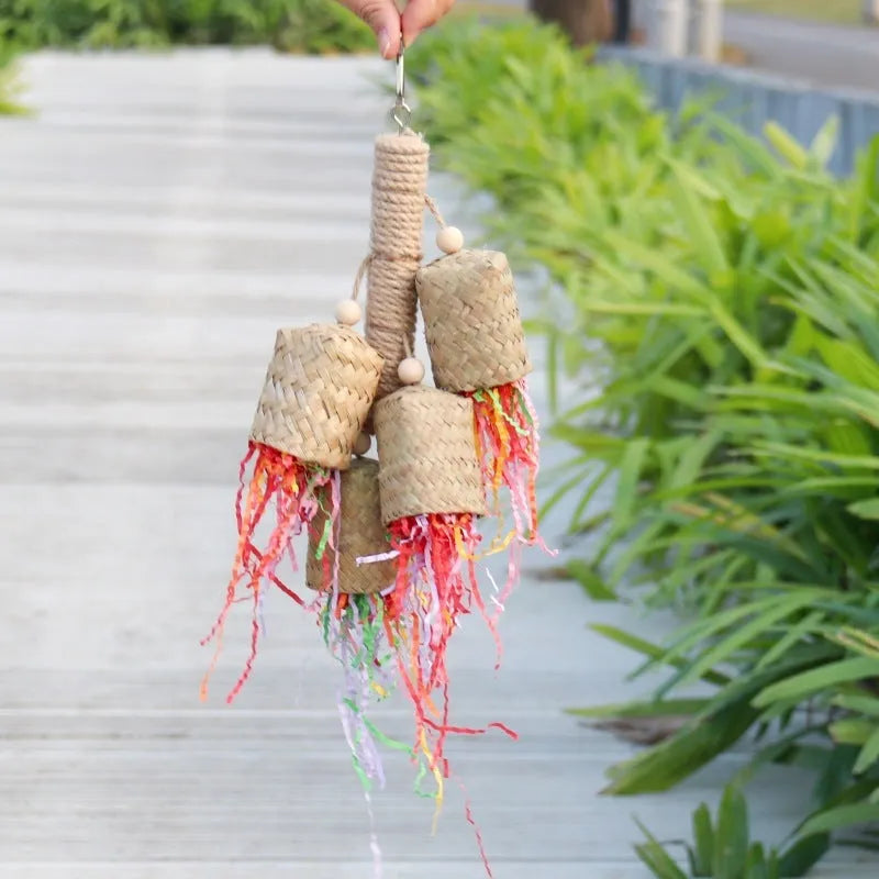 Parrot foraging toy made of wood and sisal rope with colourful shredded paper inserts