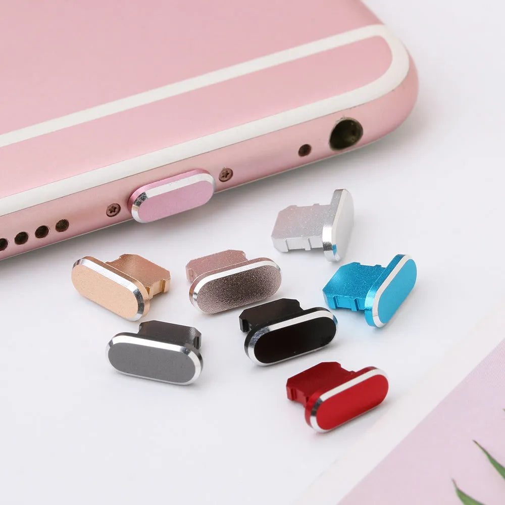 Aluminium alloy charging port dust plug for iPhone in various colours including gold, silver, blue, and black.