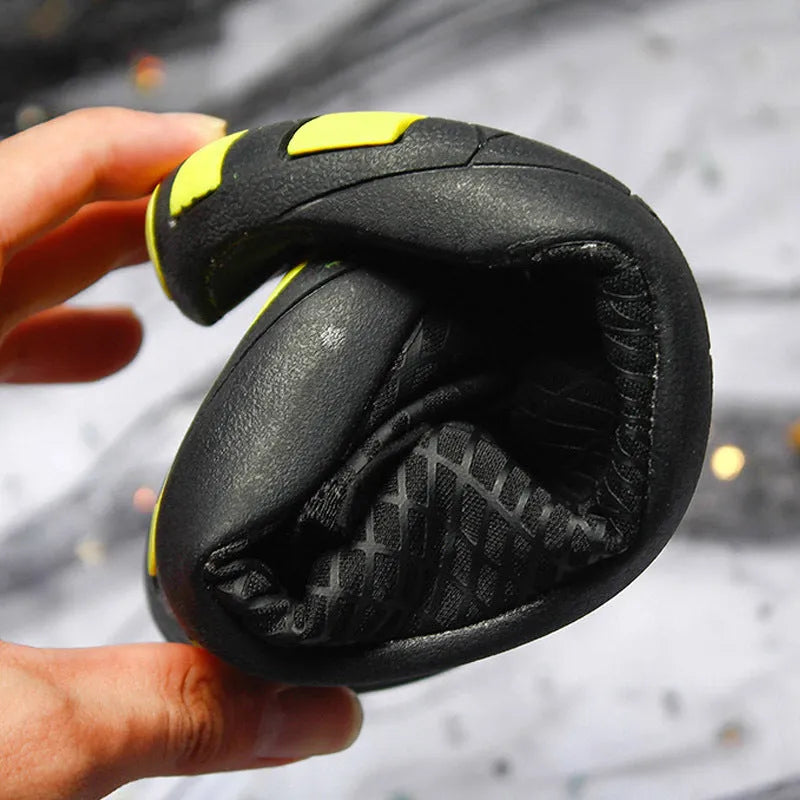 Children's snorkelling socks and river shoes with natural rubber outsole and mesh upper in black