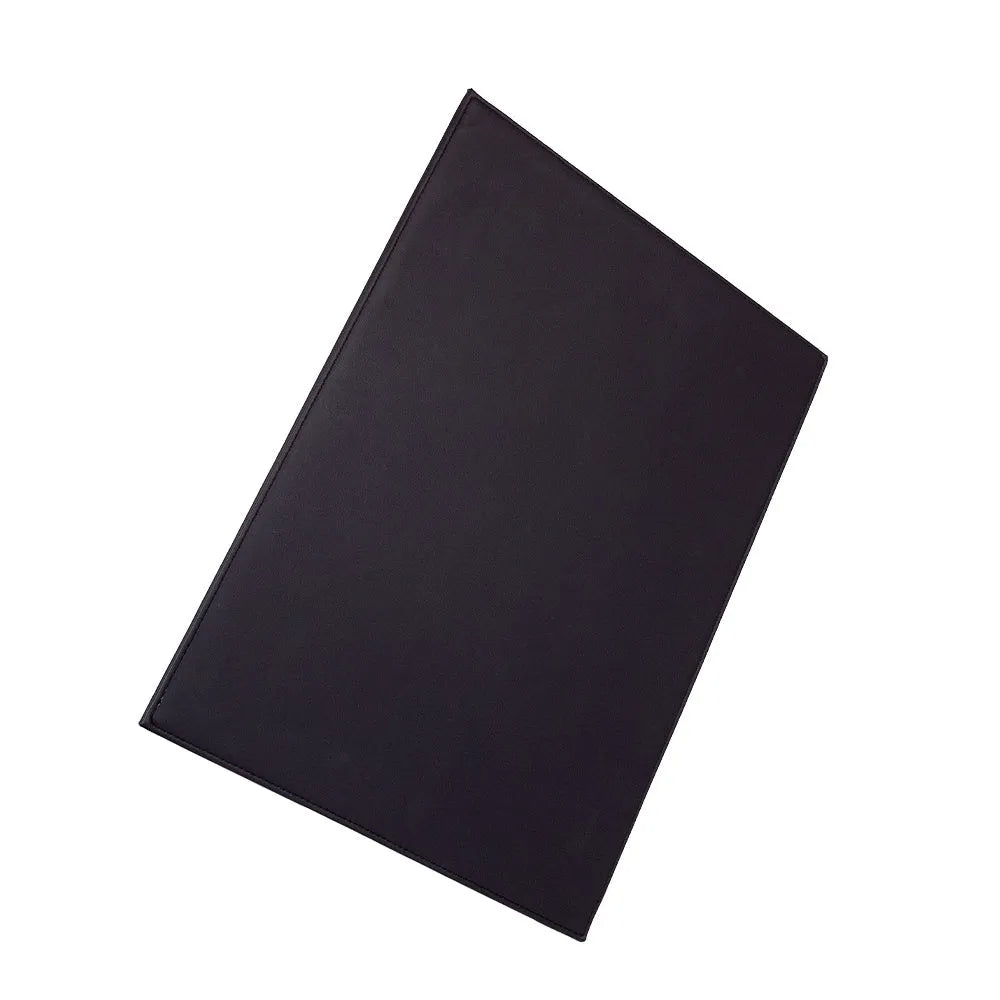 Silicone printing tablet pad in four colours on a desk with a tablet