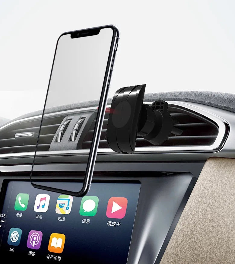 Glory black car phone holder clipped onto a car air vent, holding a mobile phone.