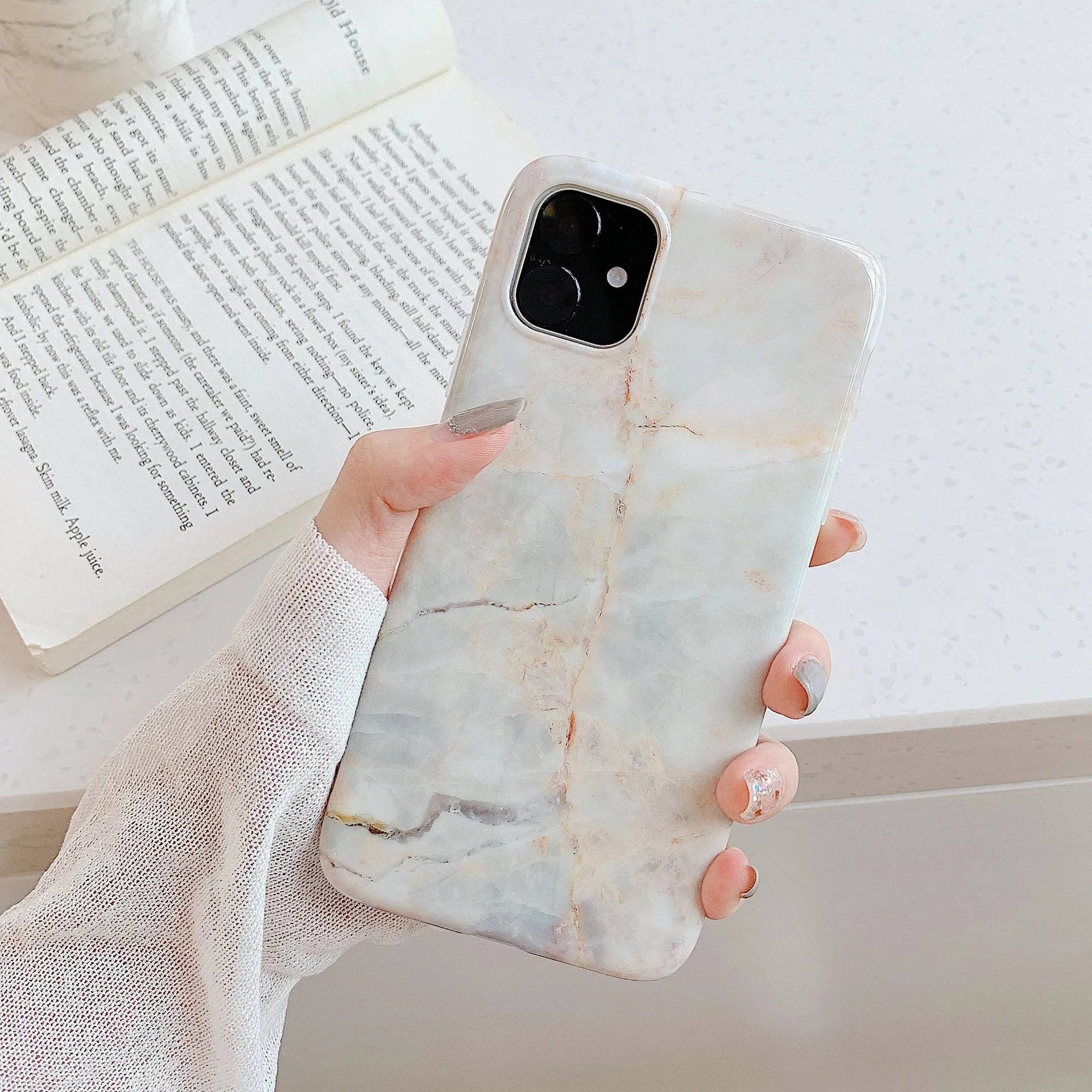 Frosty marble silicone phone case back cover with geometric pattern for iPhone models, available in multiple colours