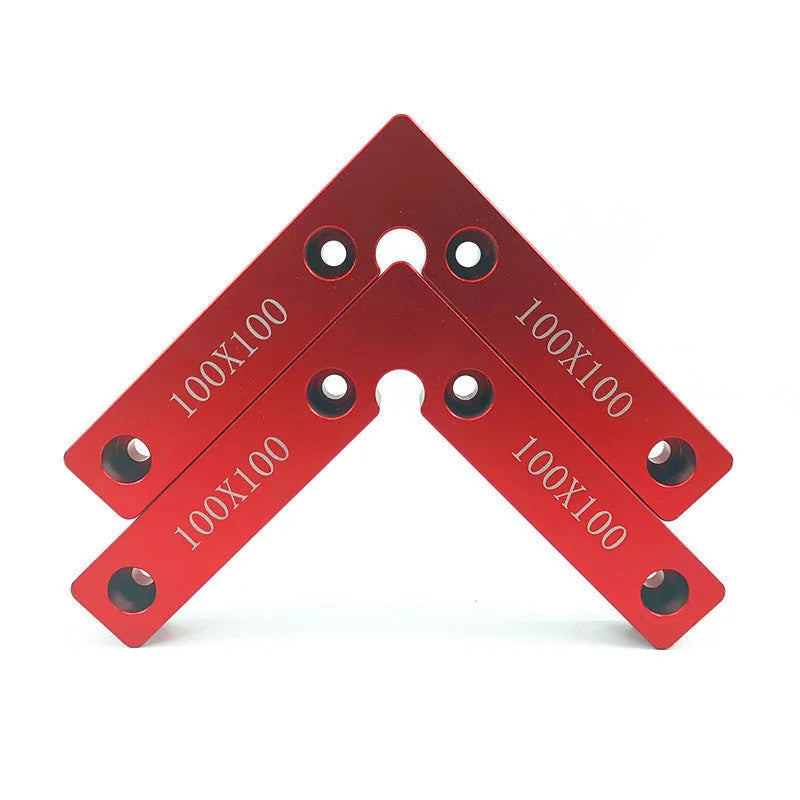 Machined aluminium right angle block with scale for woodworking jigsaw fixturing.