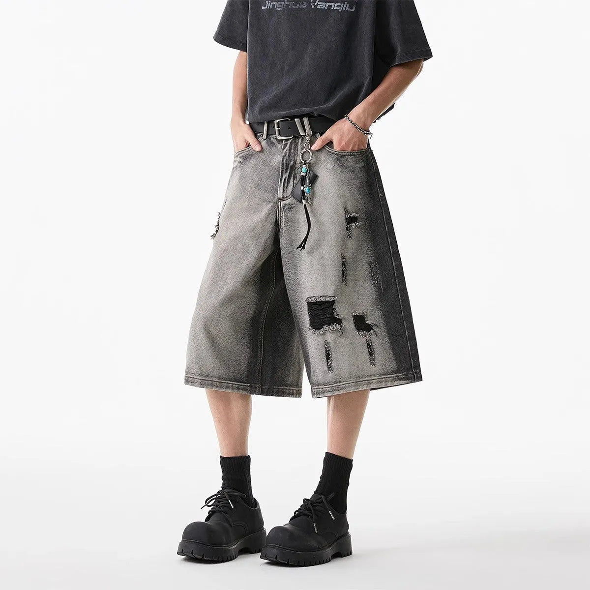 Gray water washed hole detail denim shorts with cropped length and loose fit
