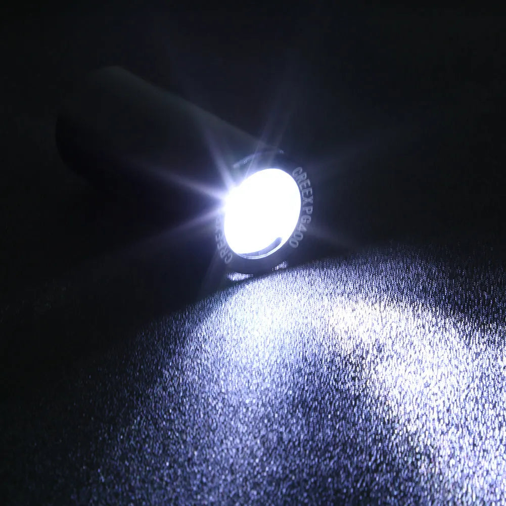 Black USB rechargeable bicycle front light with 350 lumen output and adjustable strap mount