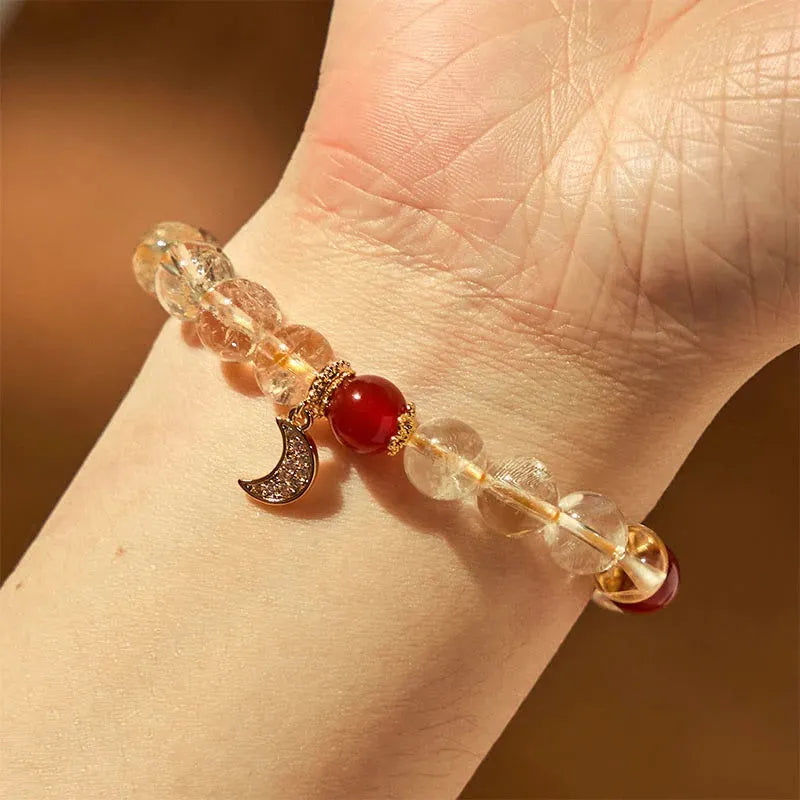 Citrine Red Agate Moon Boom Bracelet showing crystal stones and celestial charms