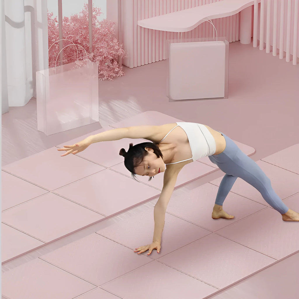 Blue folded and unfolded thickened TPE gymnastic mat on a wooden floor.