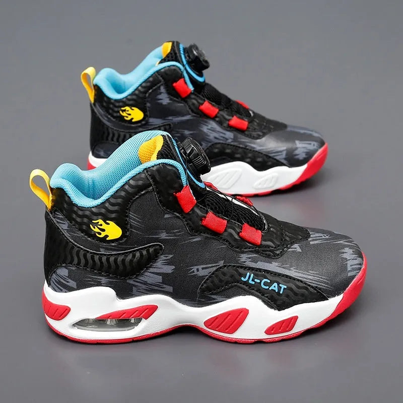 Children's black running shoes with a rotating button closure and cushion basketball design on a white background.