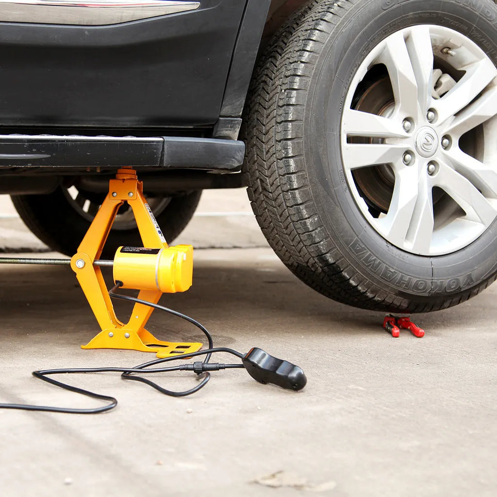 TY002 model electric hydraulic car jack kit with remote control, showing extended height.