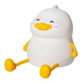 Chubby Night Light portable LED desk lamp on a wooden table showing soft glow and compact design